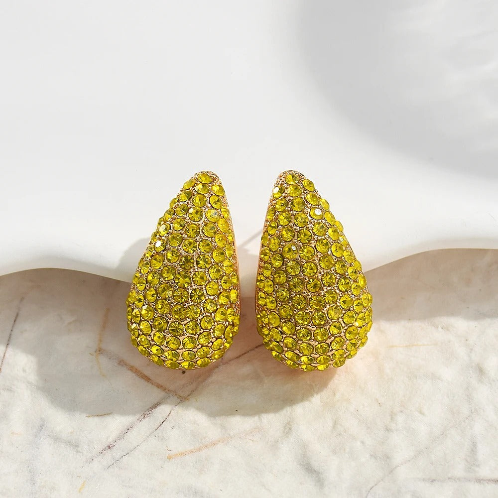 Pendientes vintage dorados con piedras preciosas amarillas