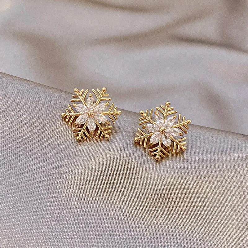 Pendientes vintage de copo de nieve de oro y cristal