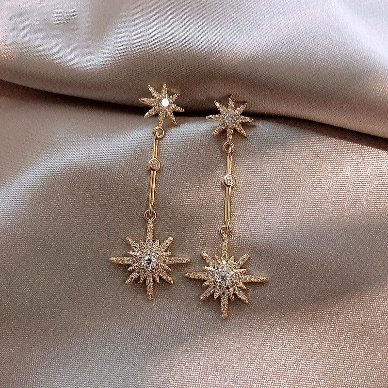 Pendientes vintage de estrella de oro y cristal
