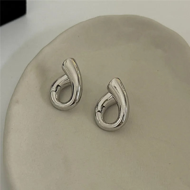 Boucles d'oreilles puces vintage en argent torsadé en forme de larme