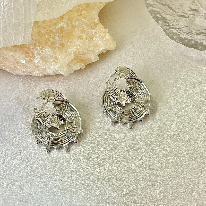 Pendientes vintage de plata con espirales esculpidos