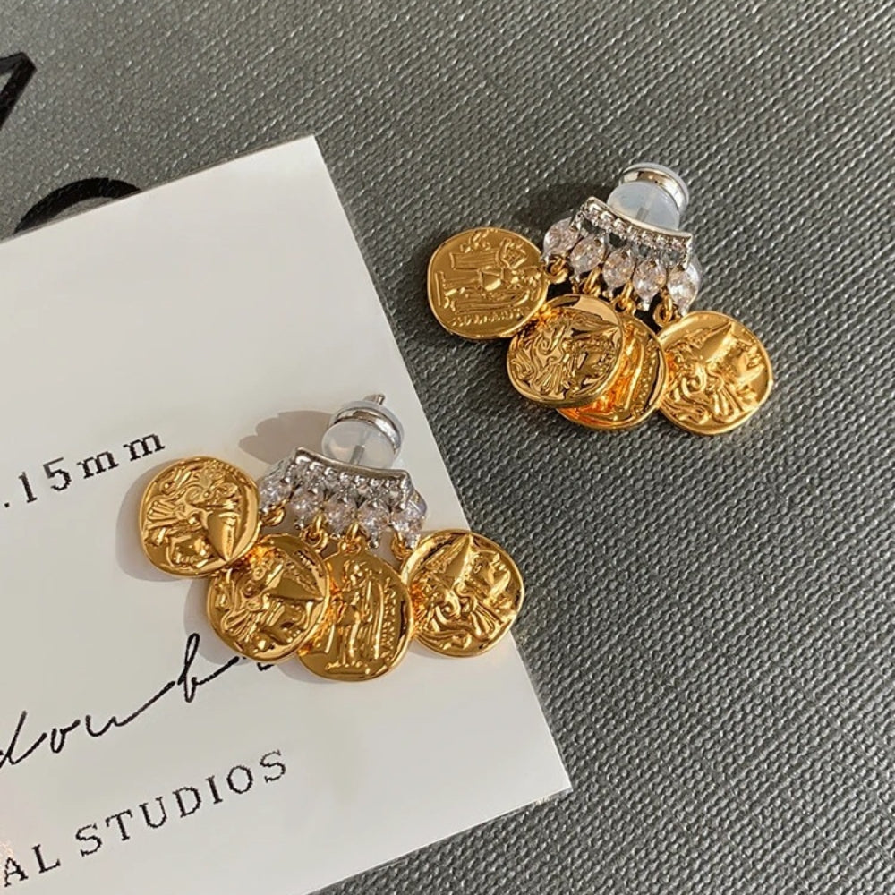 Pendientes colgantes de cristal transparente con moneda de oro