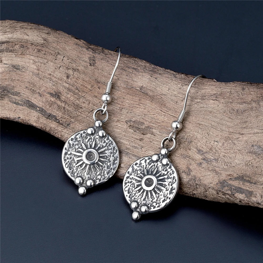 Pendientes vintage de plata con forma de sol