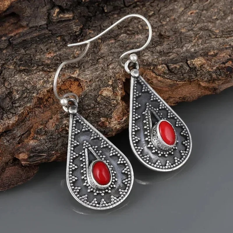 Boucles d'oreilles pendantes vintage en argent et pierre rouge