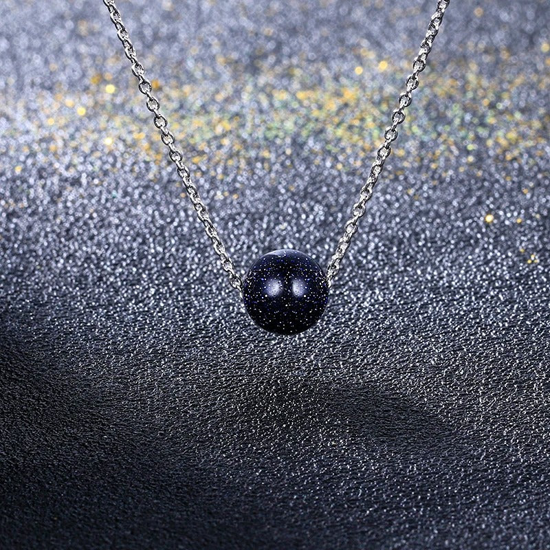 Collier pendentif en grès bleu argenté