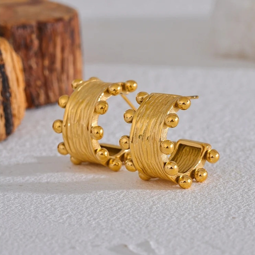 Pendientes de aro vintage dorados en forma de C
