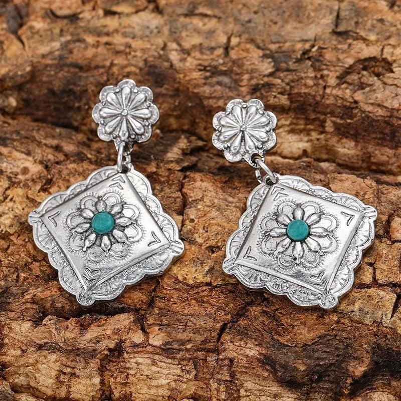 Boucles d'oreilles vintage en argent gravées de motifs floraux