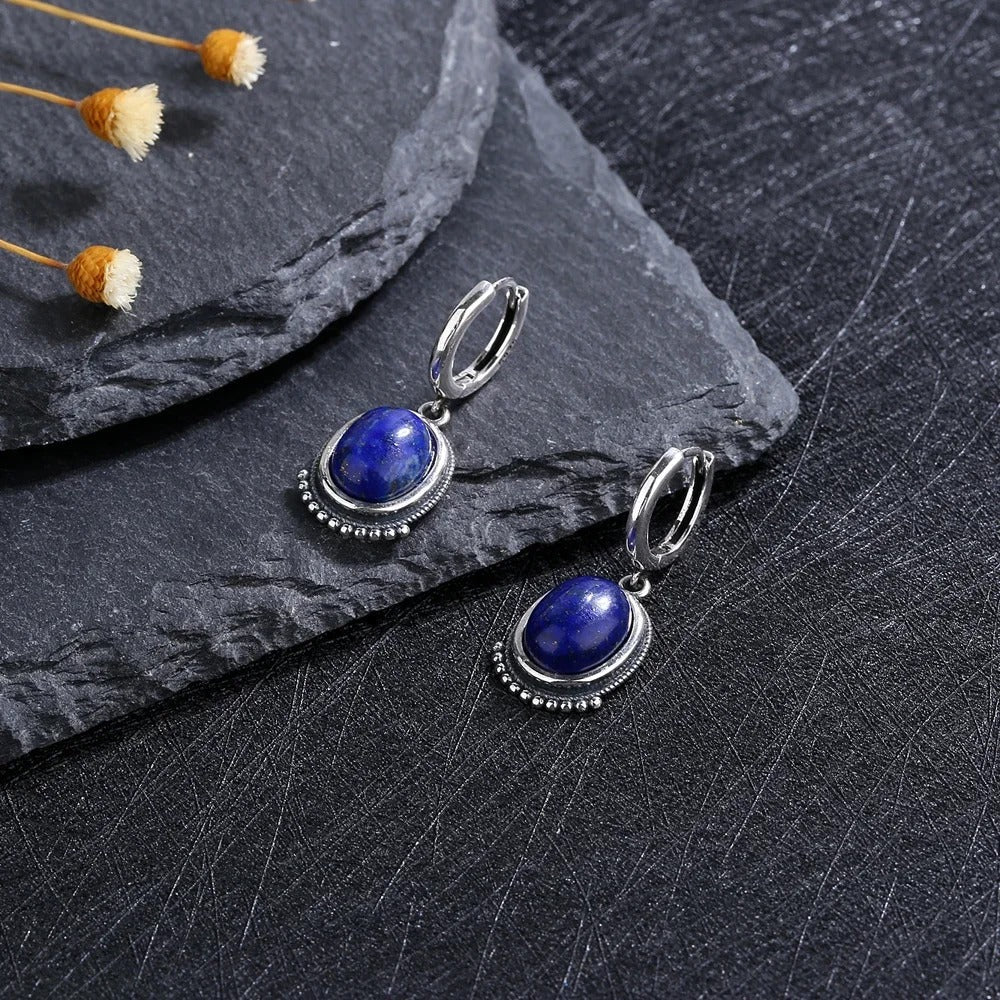 Boucles d'oreilles vintage en argent et pierre bleue