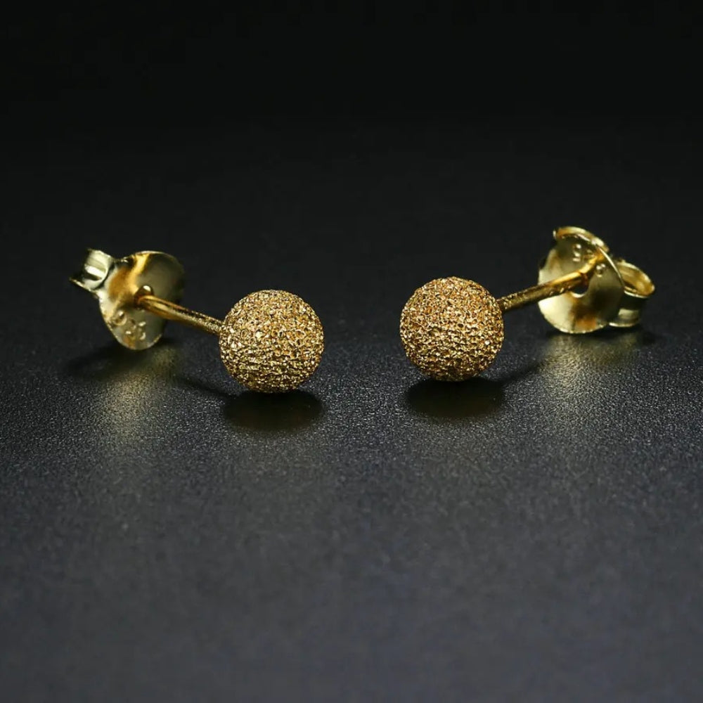 Pendientes con diseño de bola texturizada brillante dorada