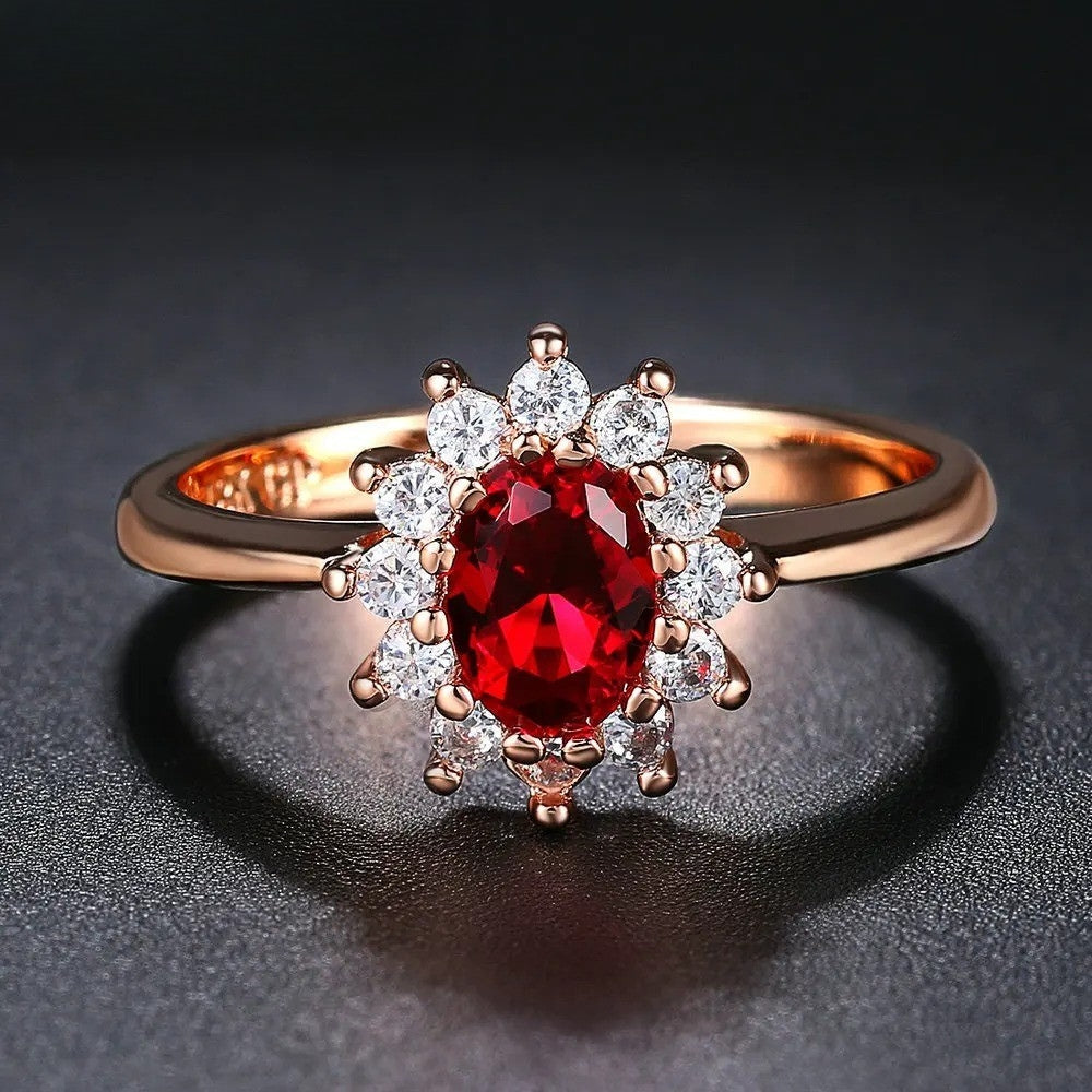 Anillo vintage de oro rosa con centro ovalado rojo