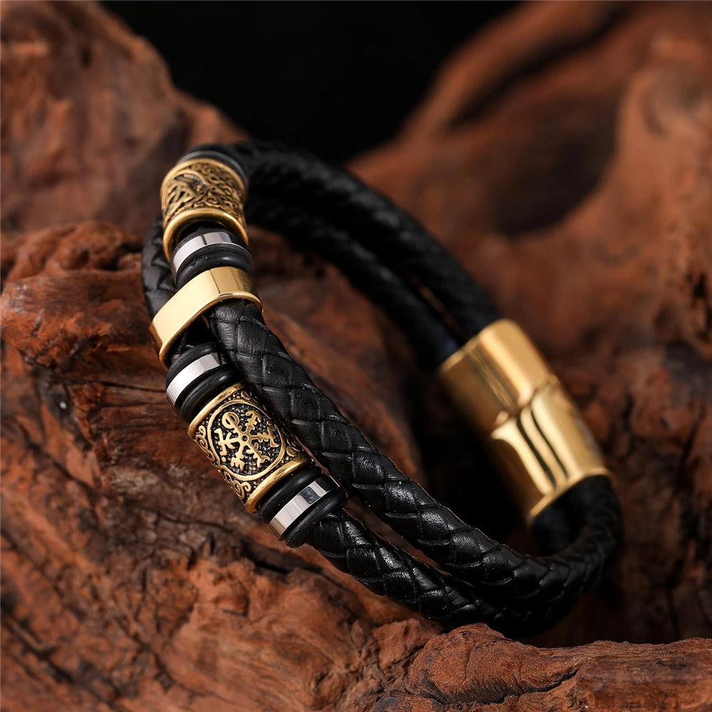Pulsera de cuero tejido negro y dijes dorados