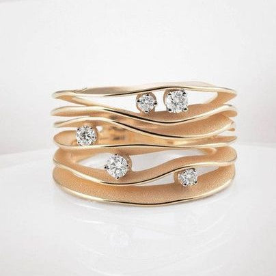 Bague vintage Dune en or et zirconiums superposés