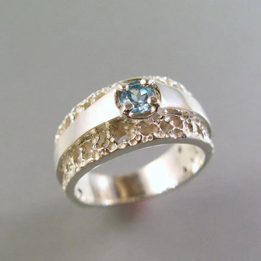 Anillo vintage hueco de oro y plata con cristal azul