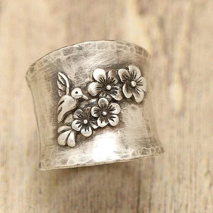 Bague large oiseau et fleur