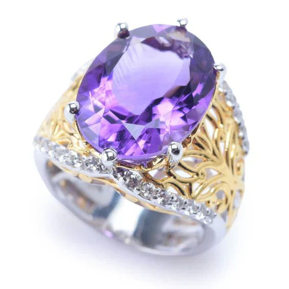 Anillo vintage de oro y plata con cristal morado 