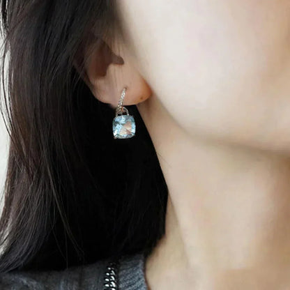 Boucles d'oreilles en cristal bleu et argent
