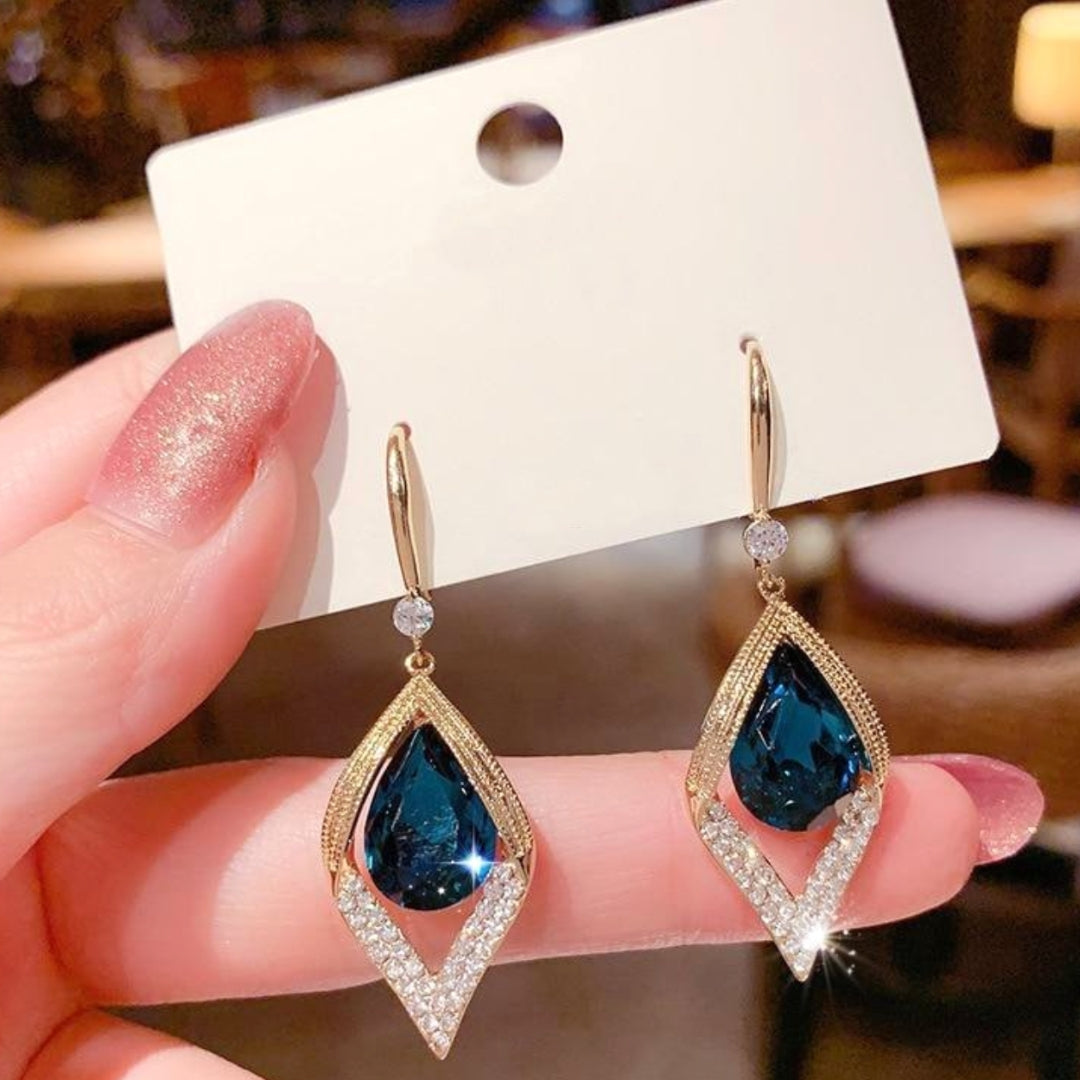 Boucles d'oreilles pendantes en opale et or