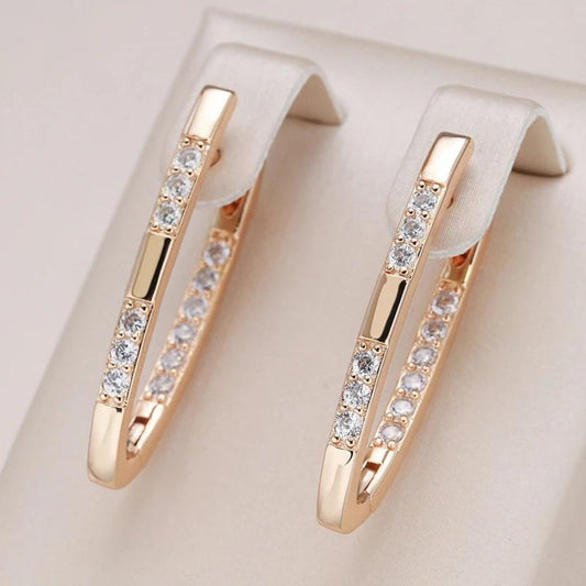 Boucles d'oreilles élégantes en zircone et or 