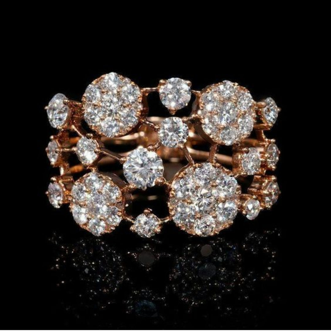 Anillo vintage de oro rosa con incrustaciones de piedras brillantes 