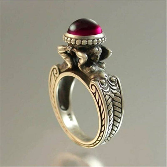 Anillo vintage con incrustaciones de piedra roja 