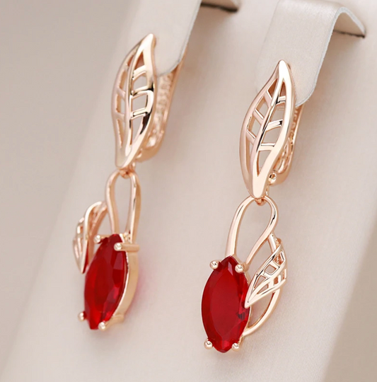 Boucles d'oreilles pendantes élégantes en cristal rouge 