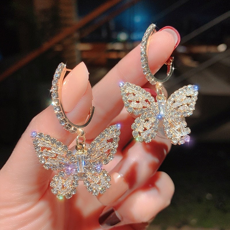 Boucles d'oreilles papillon avec zirconias en or 