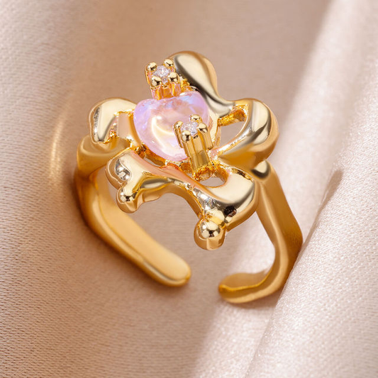 Anillo de corazón de cristal cósmico dorado