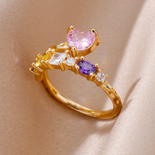 Anillo de corazón de circonita rosa dorada 