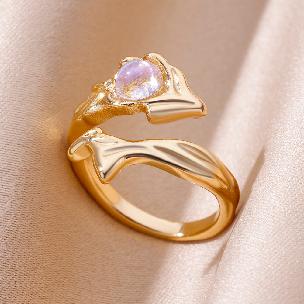 Anillo de cristal cósmico dorado