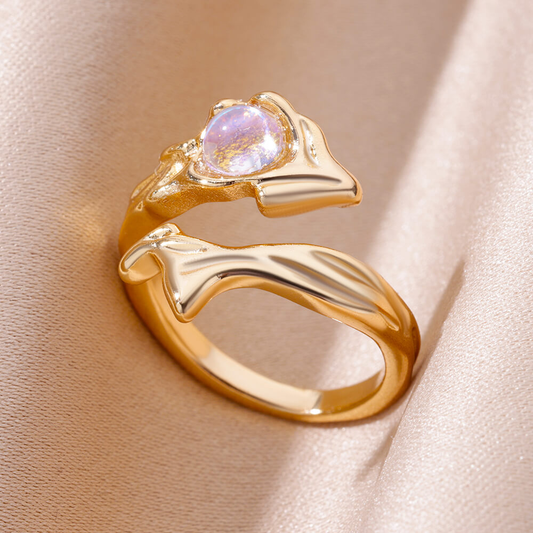 Anillo de cristal cósmico dorado