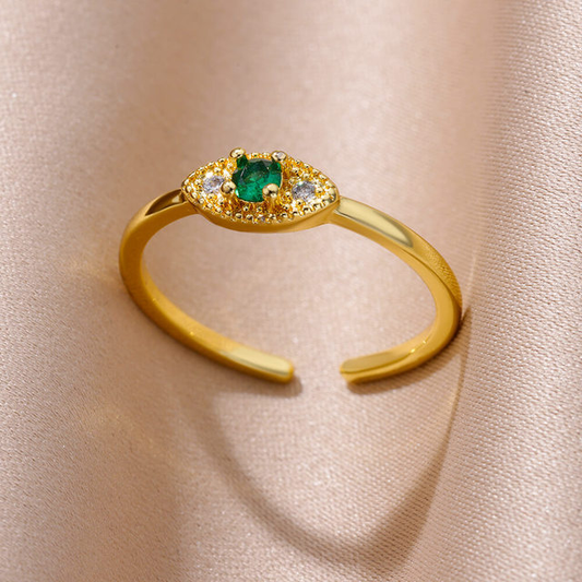 Anillo de ojo de circonita verde dorada