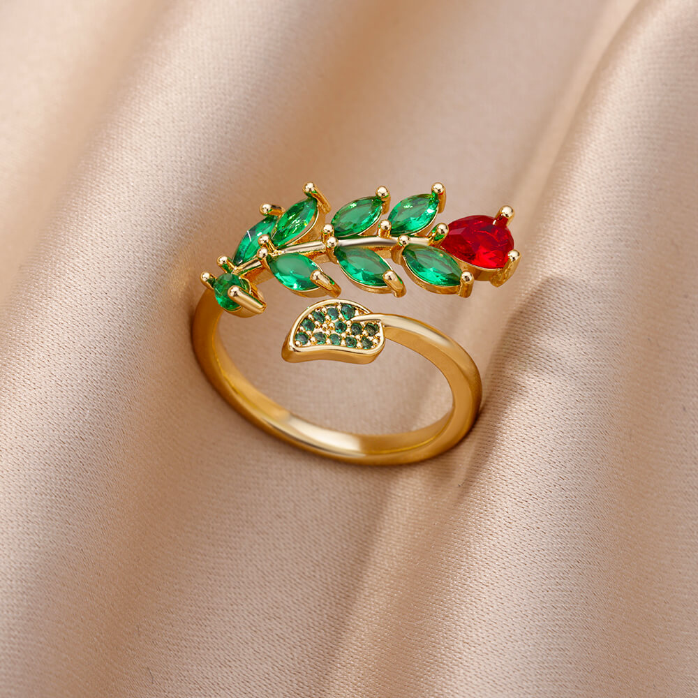 Anillo dorado con rosa de circonitas coloridas 
