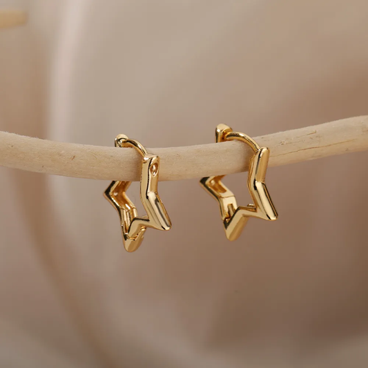 Pendientes de estrella dorada 
