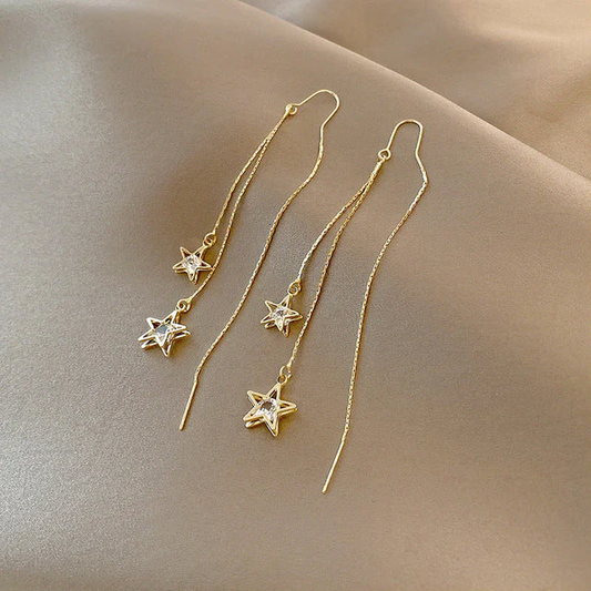 Pendientes de estrella de cristal dorado 