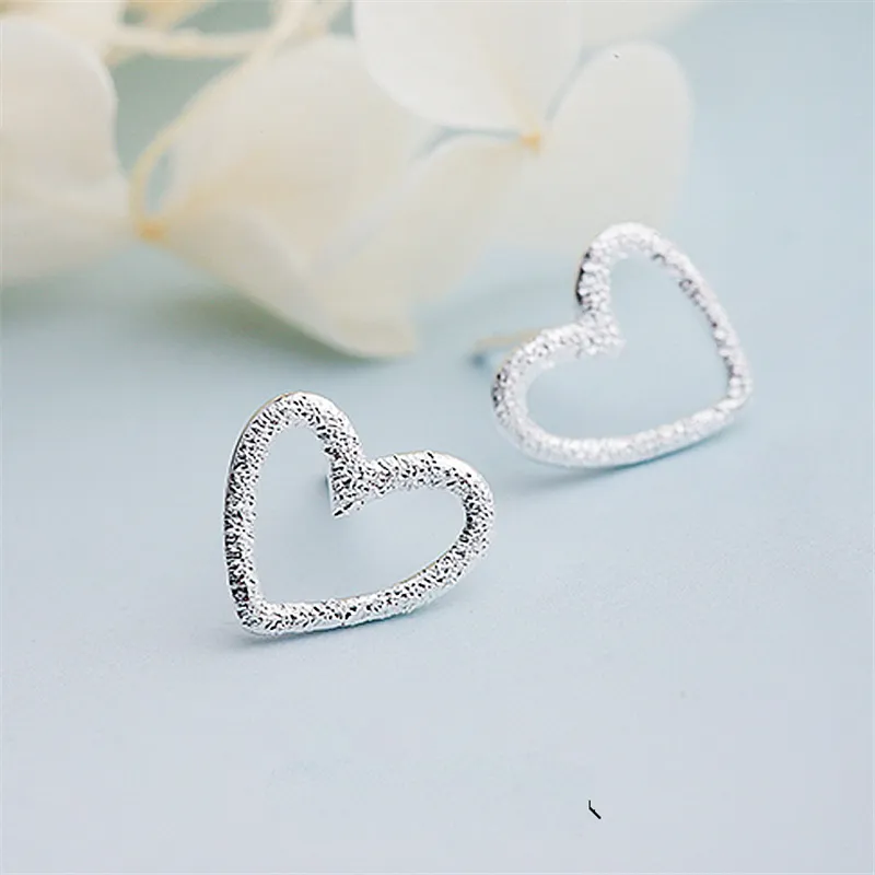Boucles d'oreilles en argent en forme de cœur brillant