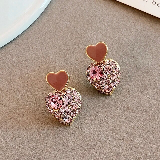 Elegantes pendientes de corazón de circonita rosa 