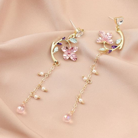 Boucles d'oreilles pendantes élégantes à motif floral en zircone