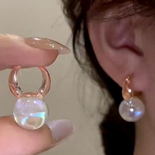 Elegantes pendientes de piedra cósmica blanca