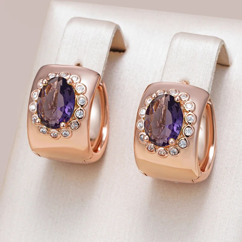 Elegantes pendientes brillantes de cristal morado 