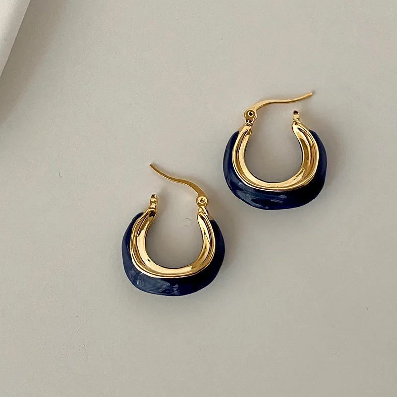 Boucles d'oreilles élégantes bleu foncé et dorées 
