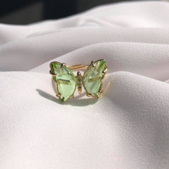 Anillo de mariposa de cristal verde