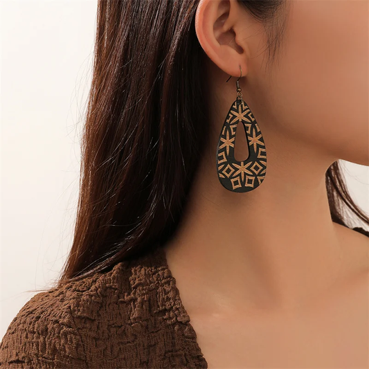 Boucles d'oreilles pendantes noires vintage ajourées