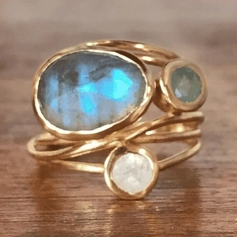Anillo vintage de piedra lunar azul con incrustaciones 