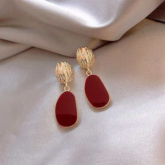Boucles d'oreilles élégantes dorées et rouges 