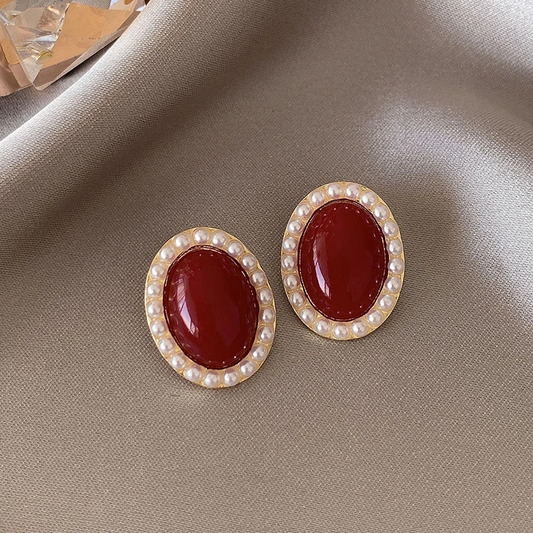 Boucles d'oreilles ovales élégantes dorées et rouges 