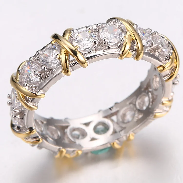 Anillo vintage elegante de circonitas en oro y plata 