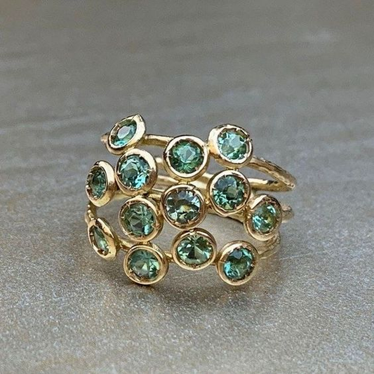 Anillo vintage de cristal con incrustaciones verdes 