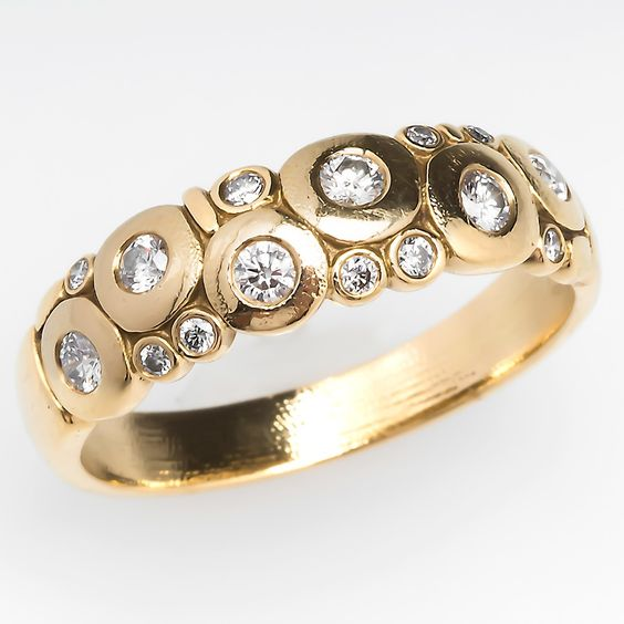 Anillo dorado vintage con cristales redondeados incrustados 