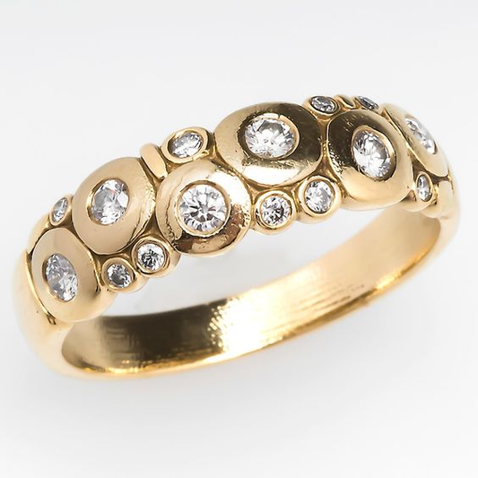 Anillo dorado vintage con cristales redondeados incrustados 