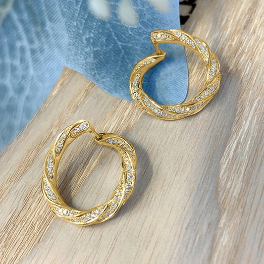 Pendientes de cristal retorcido dorado